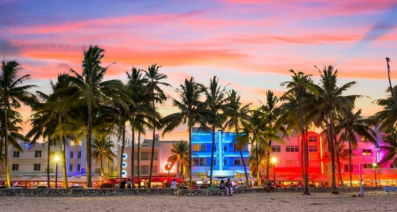 Residential Buildings in Front of Water during Sunset